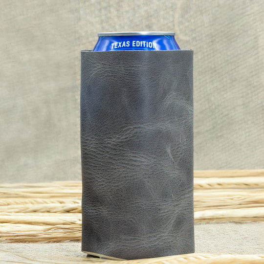 Gray can cooler with 'Texas Edition' label on a textured surface